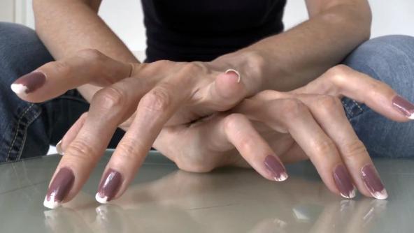 Fingernail tapping on glass plate