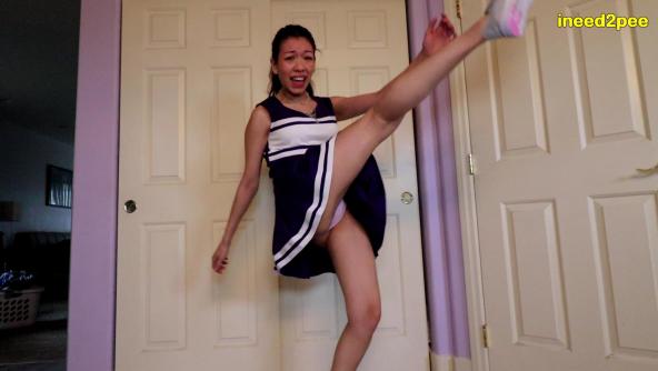 Cheerleader Miss Mia wetting her panties