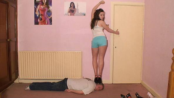 Sexy Sophie's Model Poses On Her Slaves Head