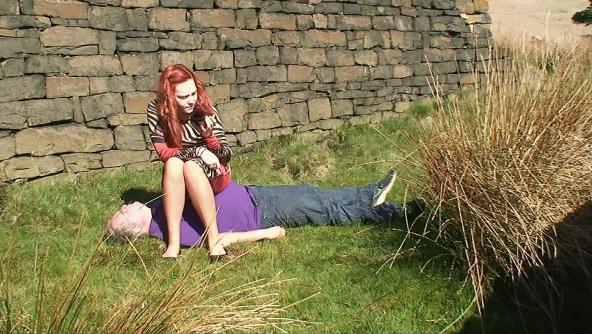 Sophie Sits On Her Slave Near The Castle