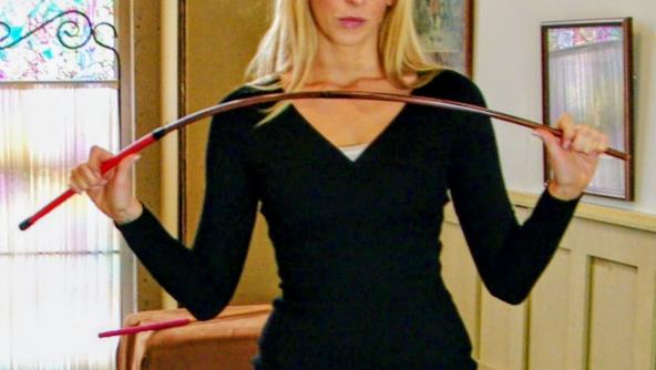 An over the knee bare bottom schoolgirl spanking